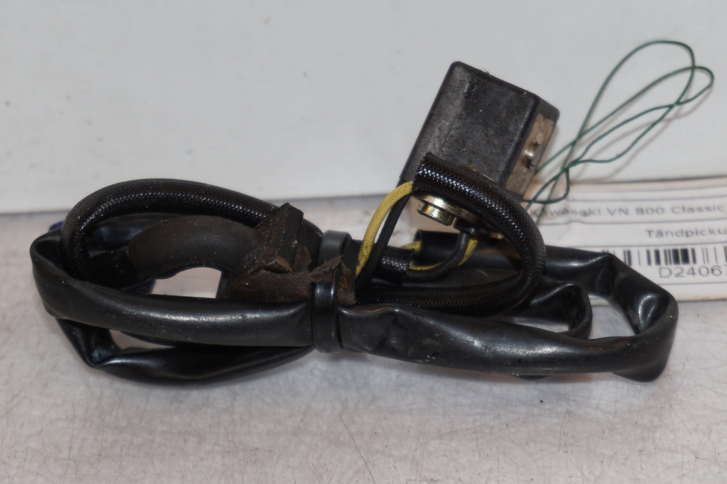 Vänster sida på Tändpickup från en Kawasaki VN 800 -1999 motorcykel.