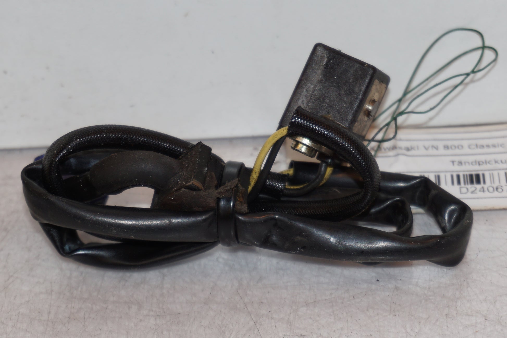 Vänster sida på Tändpickup från en Kawasaki VN 800 -1999 motorcykel.