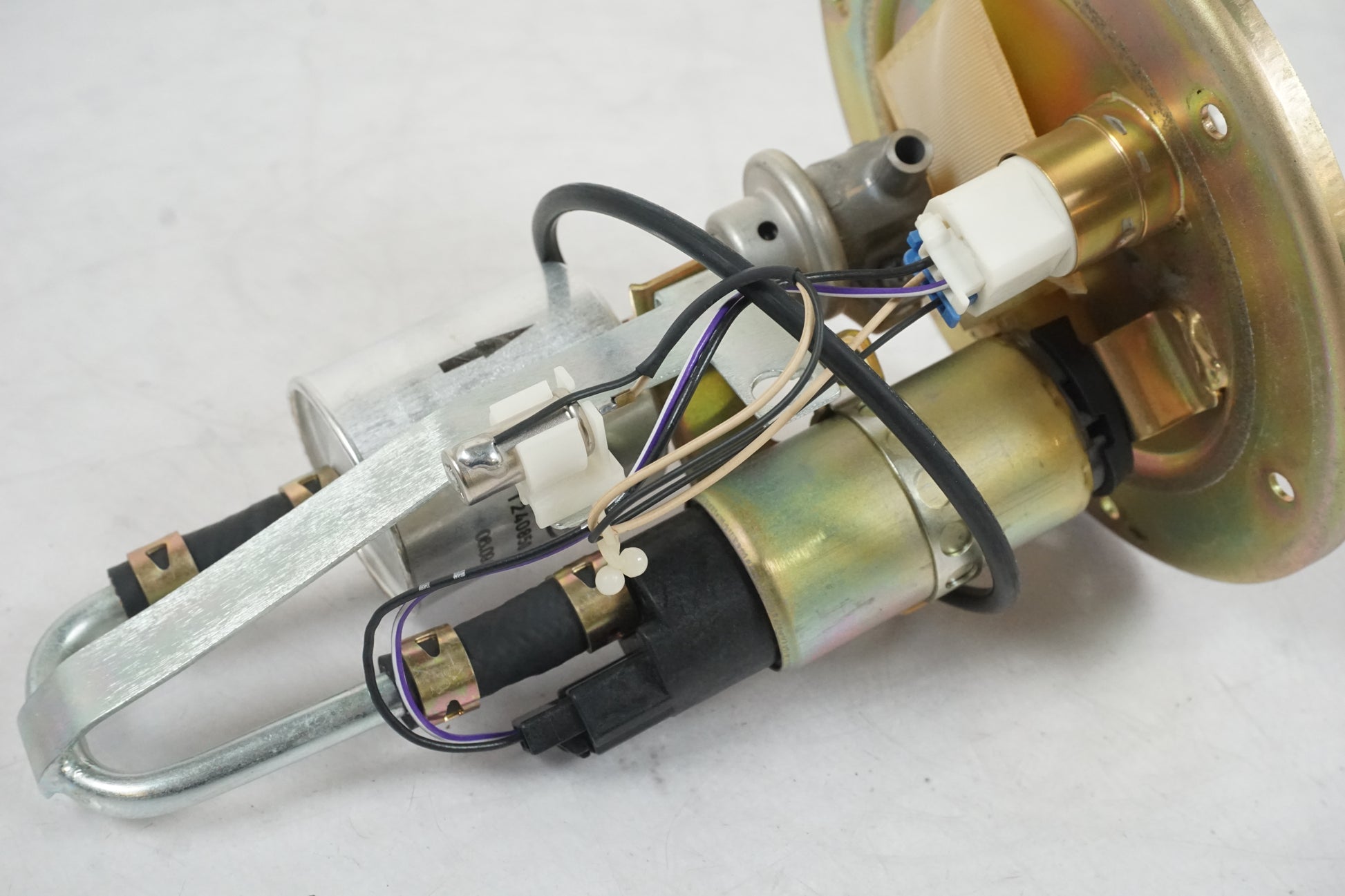 Vänster sida på Bensinpump insprut från en Triumph Daytona 650 -2005 motorcykel.