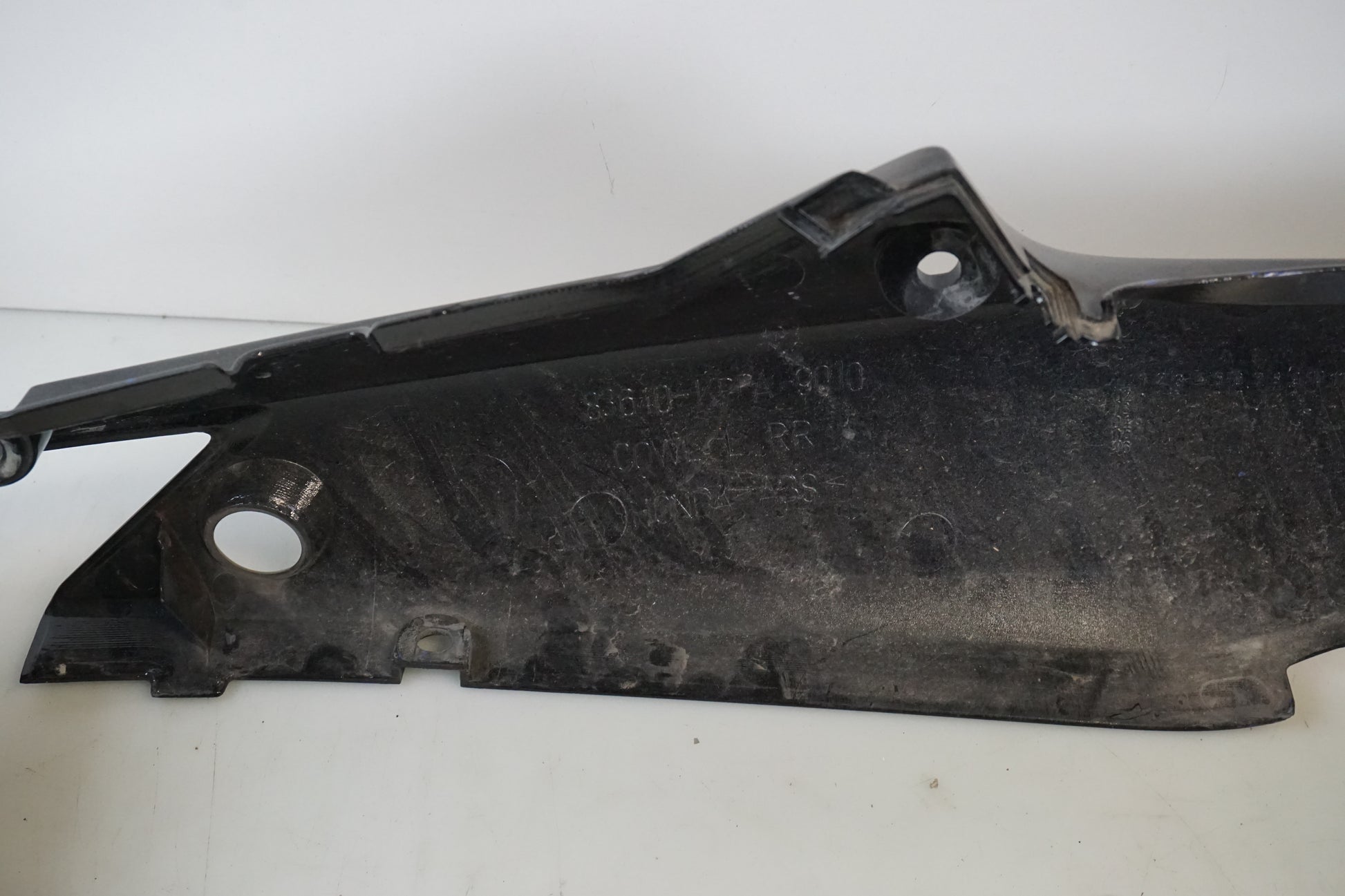 Extrabild3 på Bakvinge från en Honda CBR 125 R -2004 motorcykel.