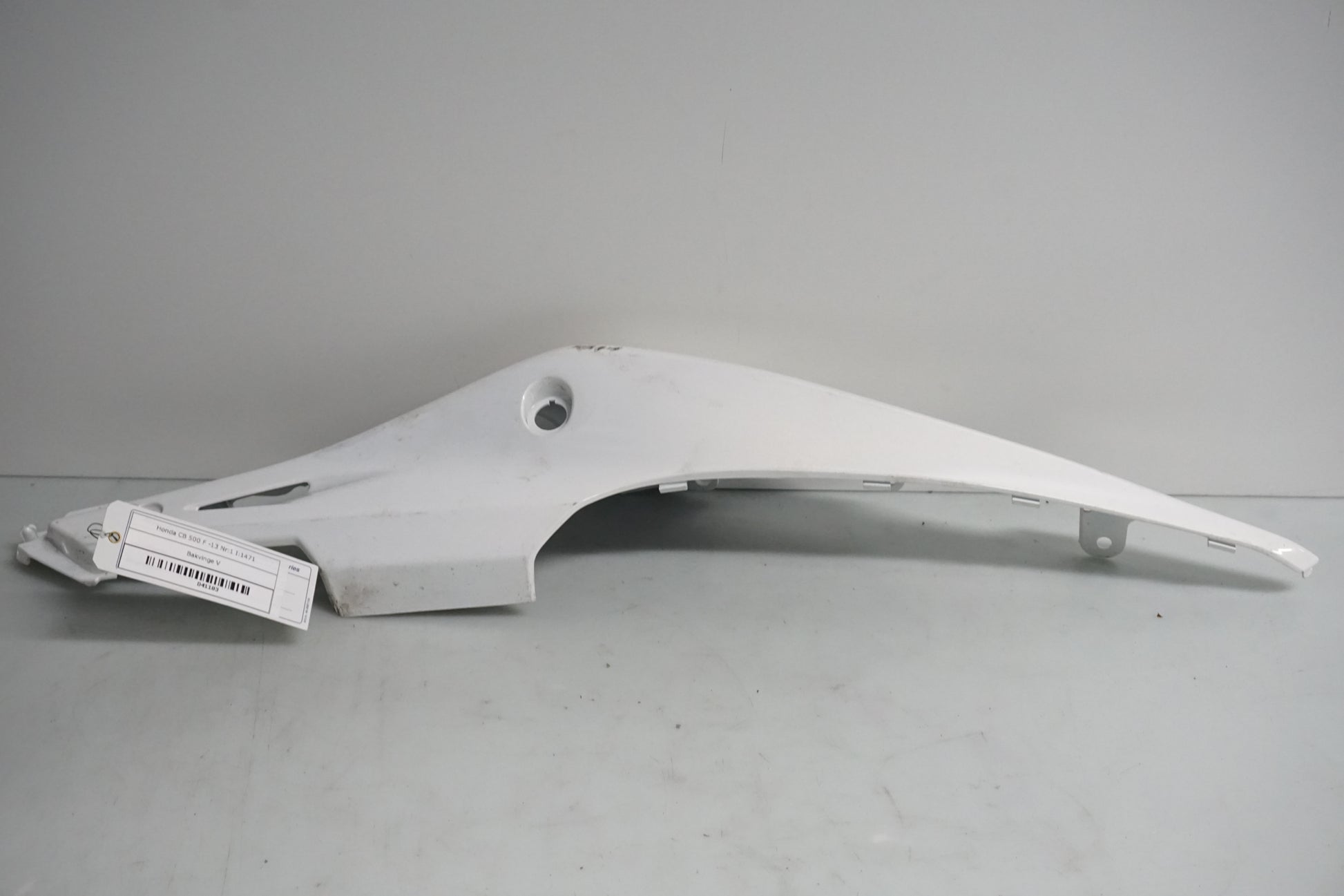 Framsidan på Bakvinge från en Honda CB 500 F -2013 motorcykel.