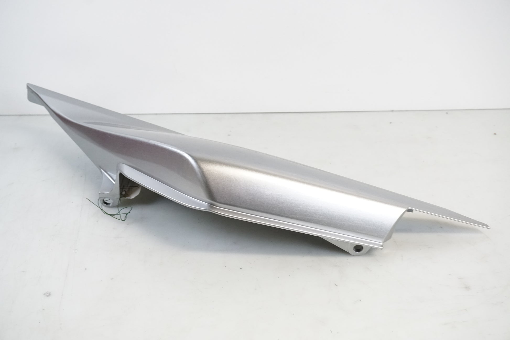 Vänster sida på Sidopanel från en Honda VFR 1200 -2010 motorcykel.