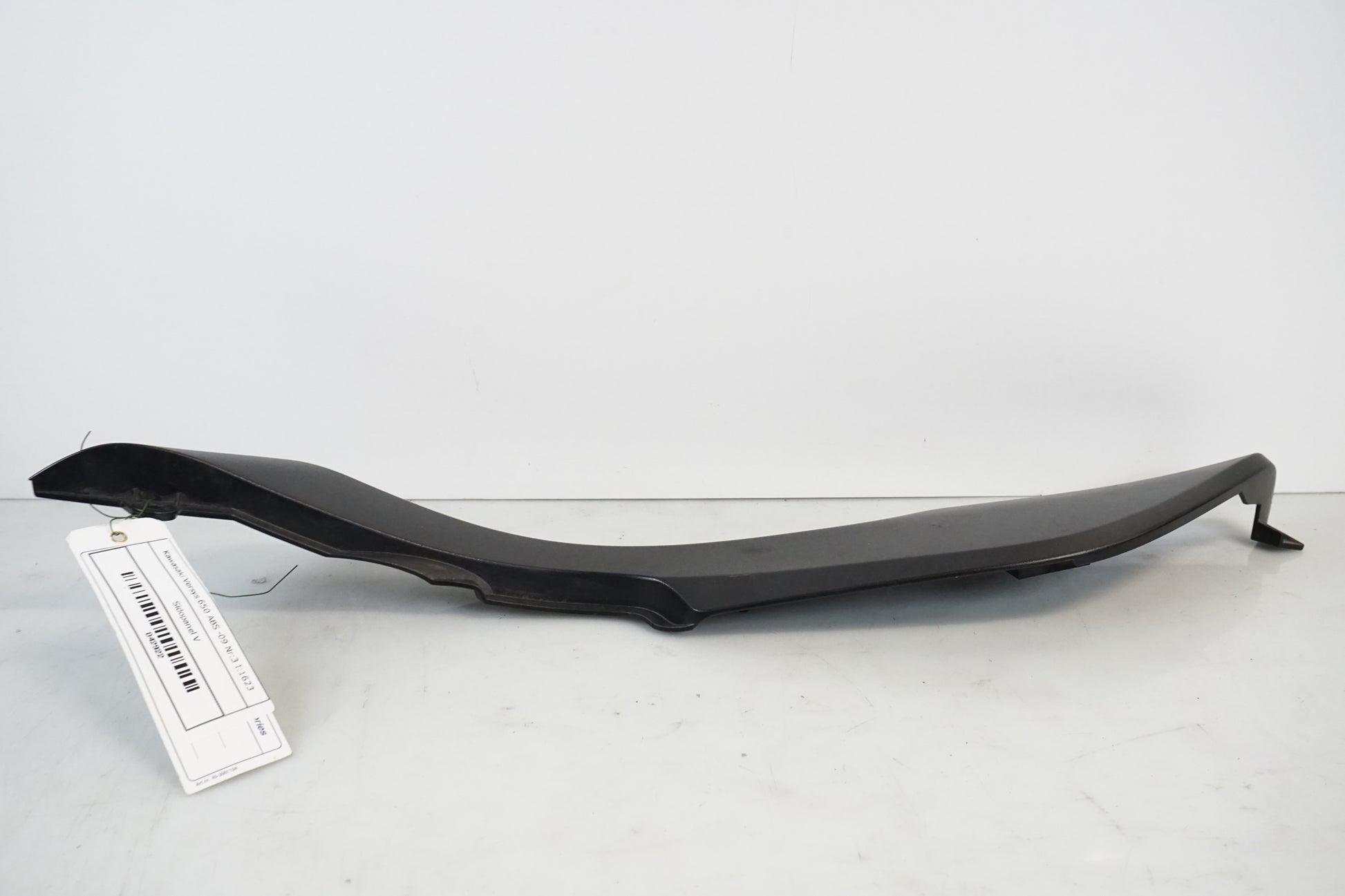 Baksidan på Sidopanel från en Kawasaki Versys 650 -2009 motorcykel.