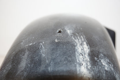 Snett nerifrån på Framskärm från en Suzuki GSX-R 750 -1997 motorcykel.