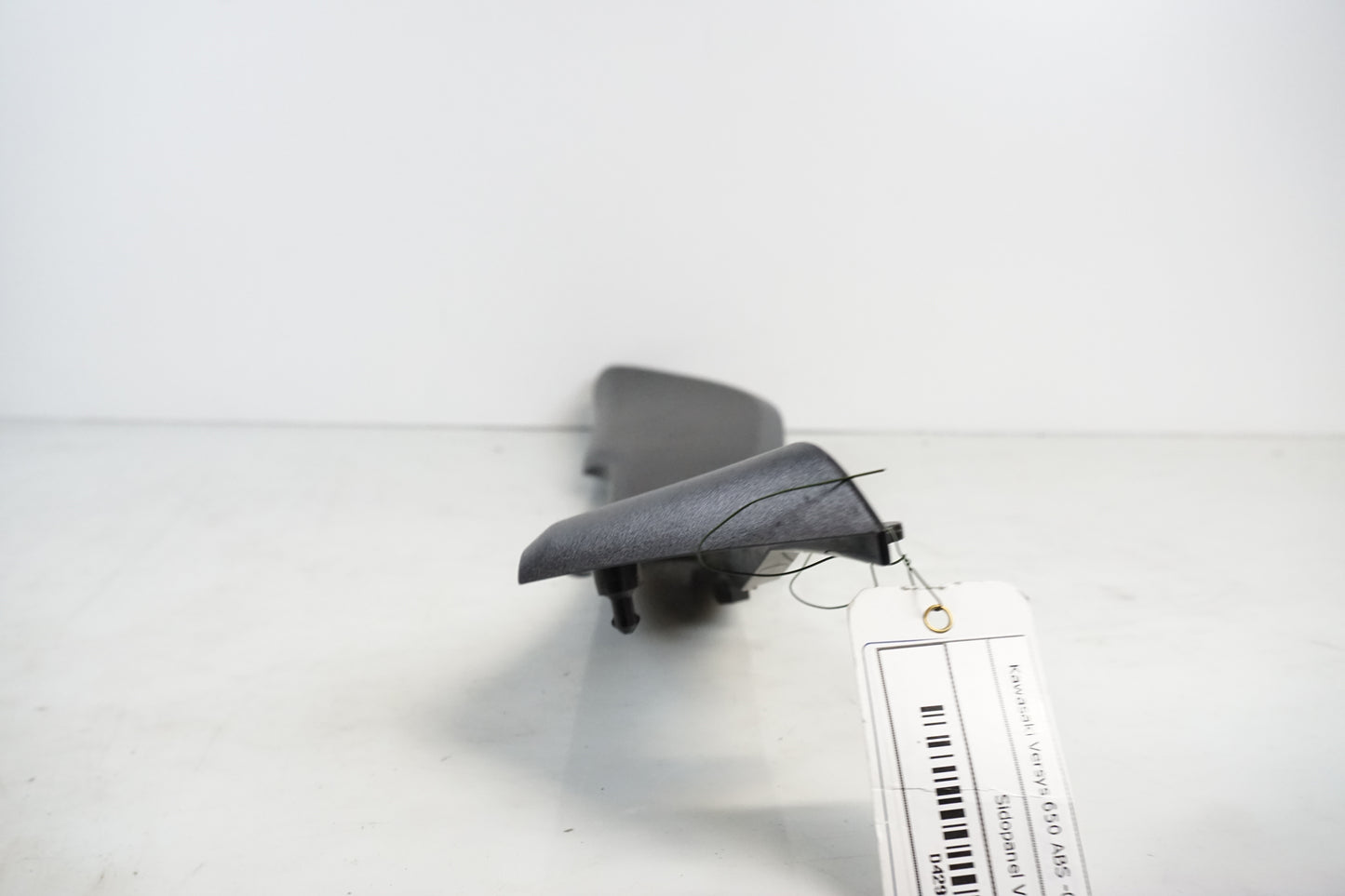 Snett uppifrån på Sidopanel från en Kawasaki Versys 650 -2009 motorcykel.