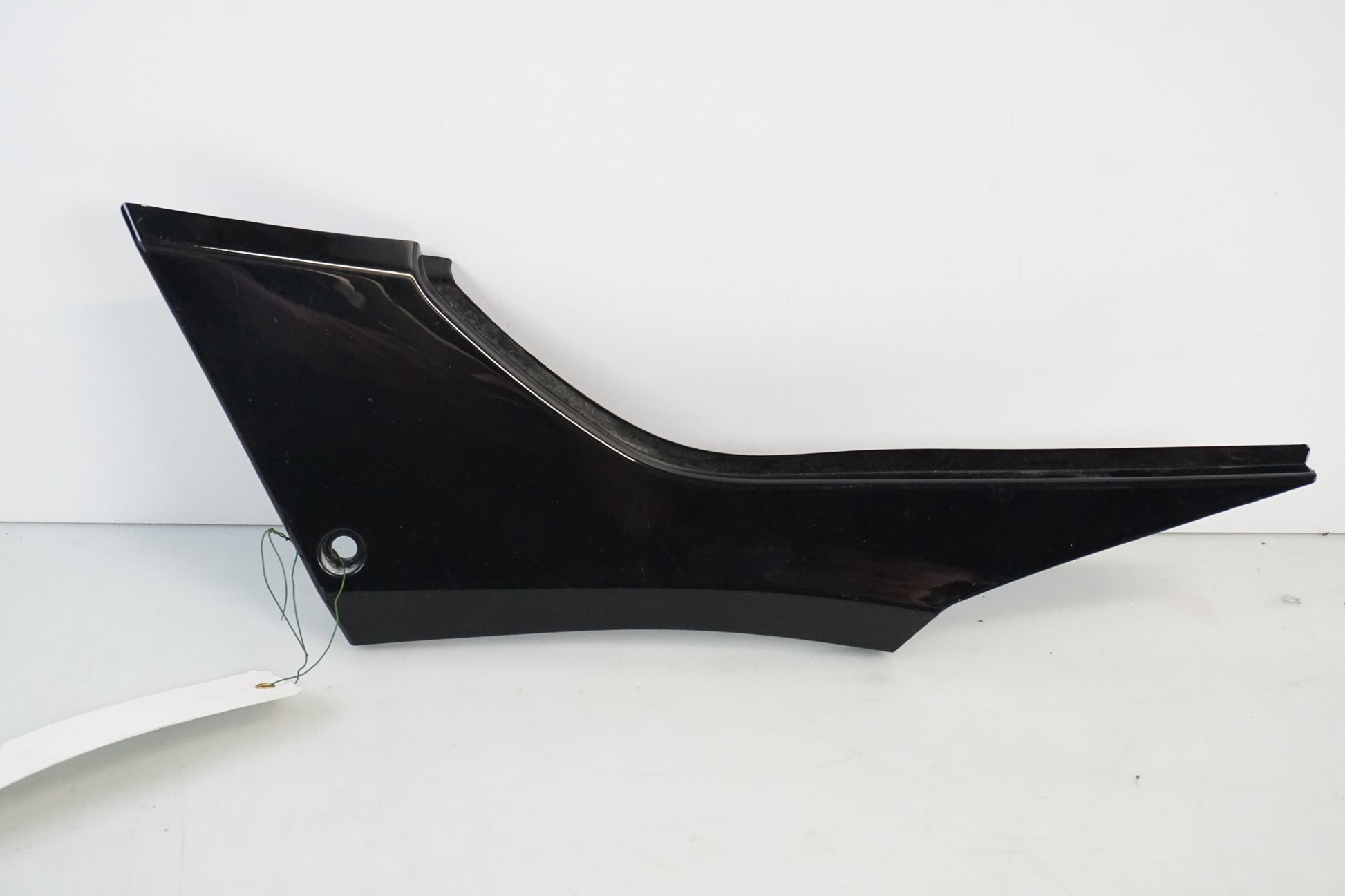 Framsidan på Sidopanel från en Kawasaki Ninja 300 -2013 motorcykel.