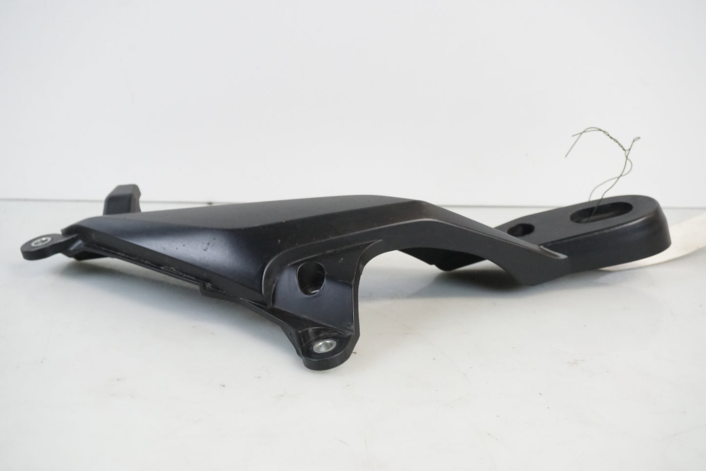 Vänster sida på Blinkersfäste från en Honda CBR 600 RR -2007 motorcykel.