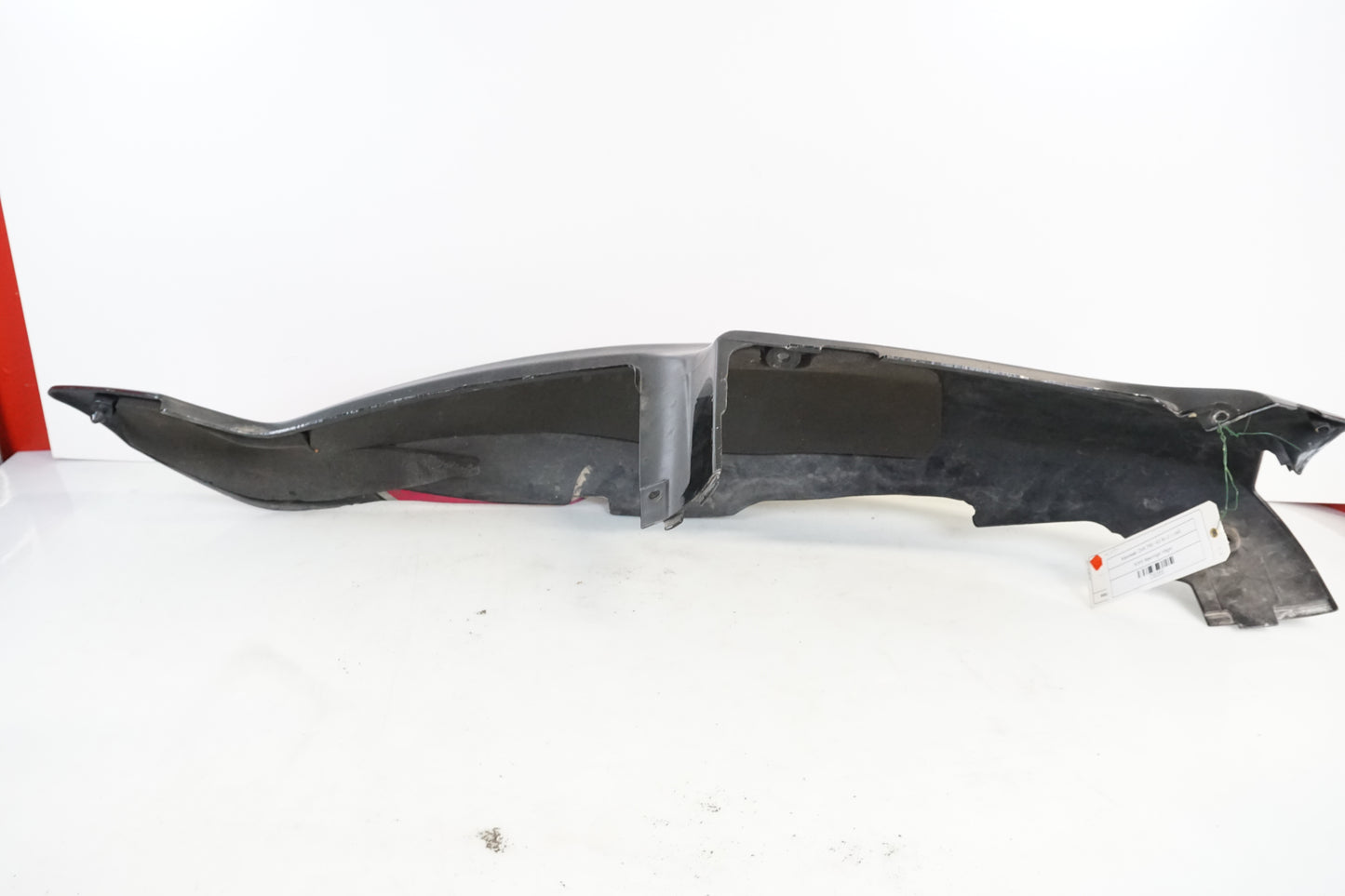 Vänster sida på Bakvinge från en Kawasaki ZXR 750 -1993 motorcykel.