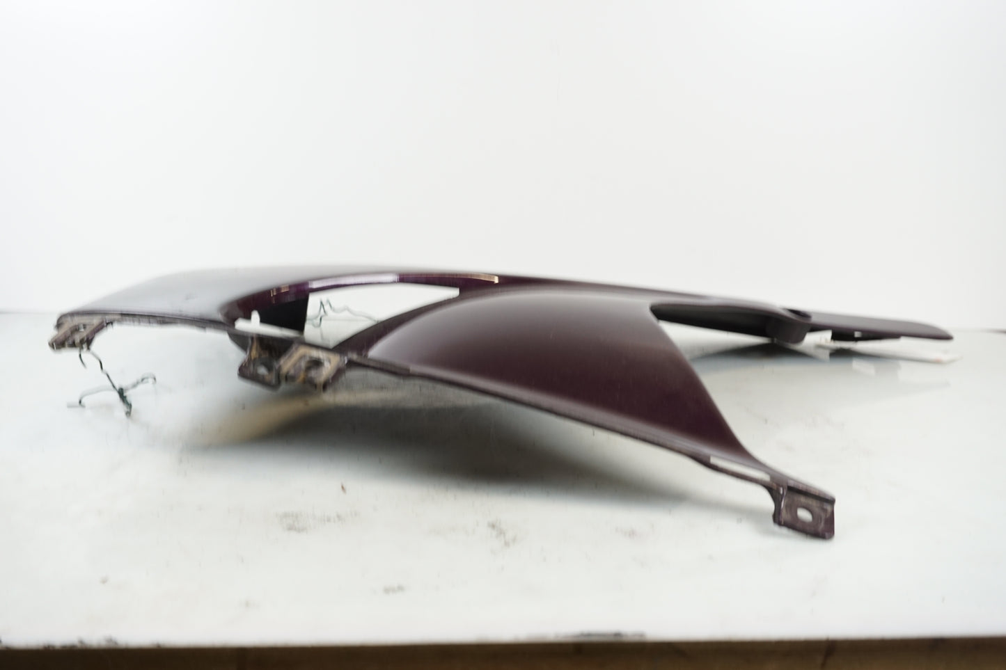 Vänster sida på Magkåpa från en Honda CBR 900 RR -1997 motorcykel.