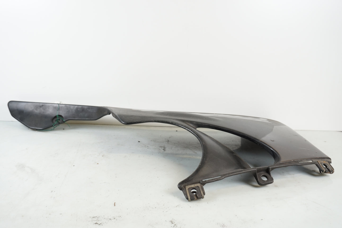 Vänster sida på Magkåpa från en Honda CBR 900 RR -1996 motorcykel.