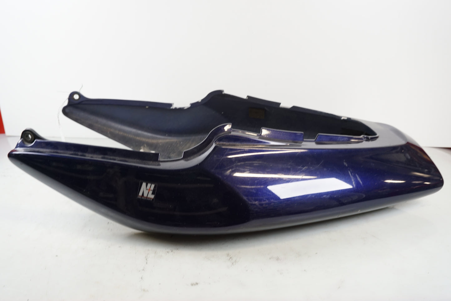 Vänster sida på Bakvinge från en Honda VTR 1000 F -2001 motorcykel.