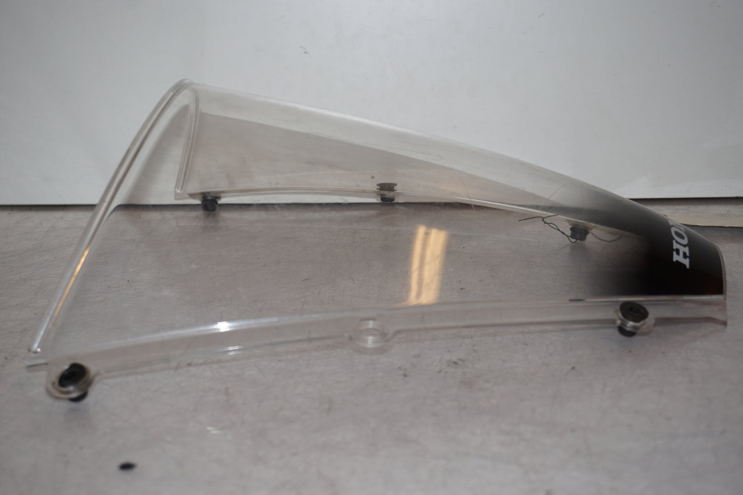 Vänster sida på Vindruta från en Honda CBR 600 RR -2003 motorcykel.