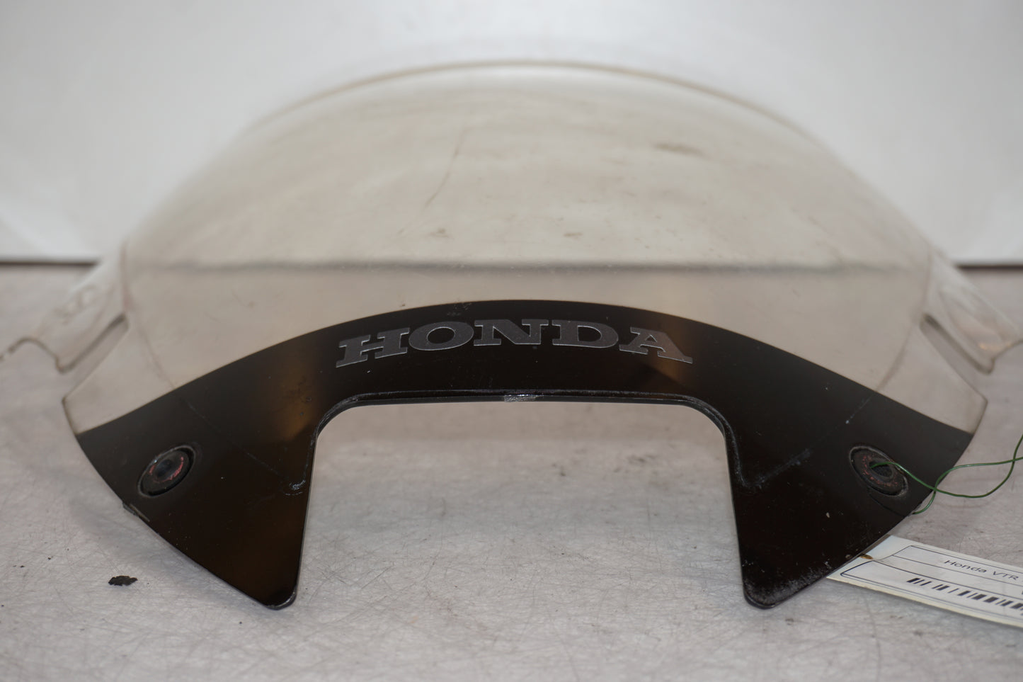 Baksidan på Vindruta från en Honda VTR 1000 F -1997 motorcykel.