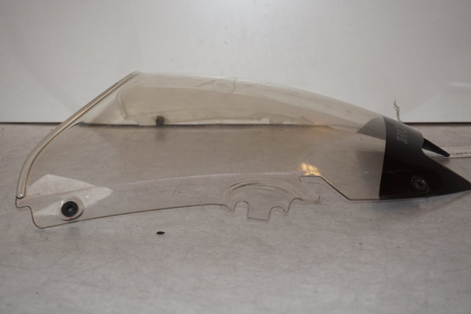 Vänster sida på Vindruta från en Honda VTR 1000 F -1997 motorcykel.