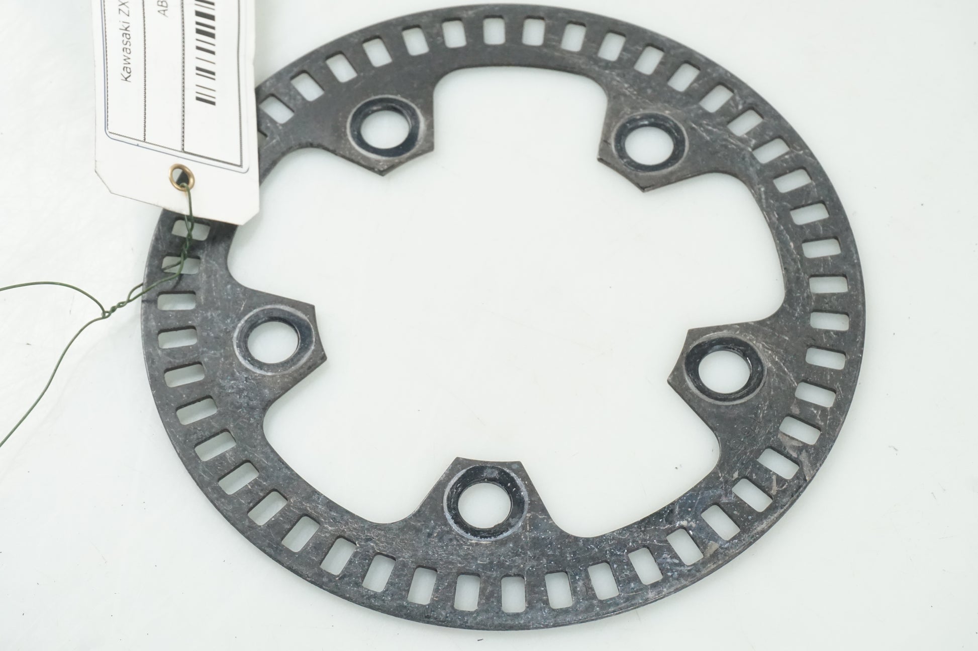 Baksidan på ABS krans från en Kawasaki ZX-10R -2012 motorcykel.