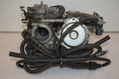 Höger sida på Förgasare från en Honda XL 650 V -2000 motorcykel.