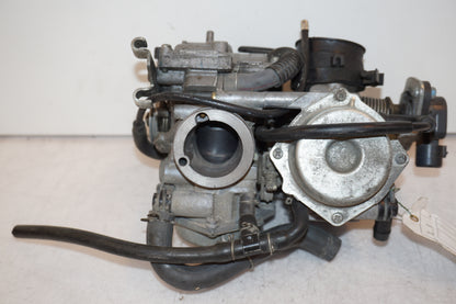 Framsidan på Förgasare från en Honda XL 650 V -2000 motorcykel.