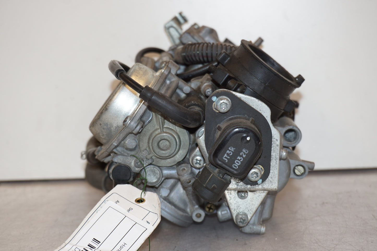 Extrabild2 på Förgasare från en Honda XL 650 V -2000 motorcykel.