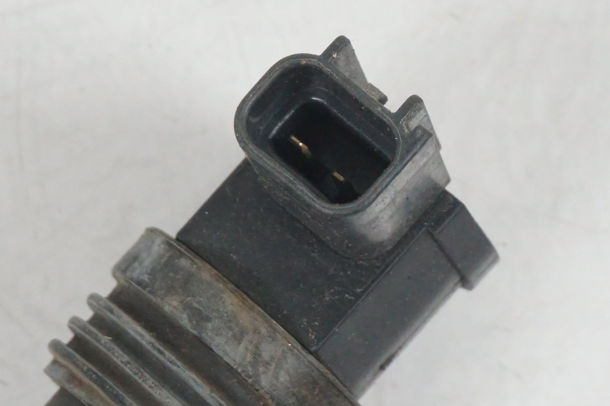 Baksidan på Tändspole från en Suzuki GSX-R 600 -1997 motorcykel.