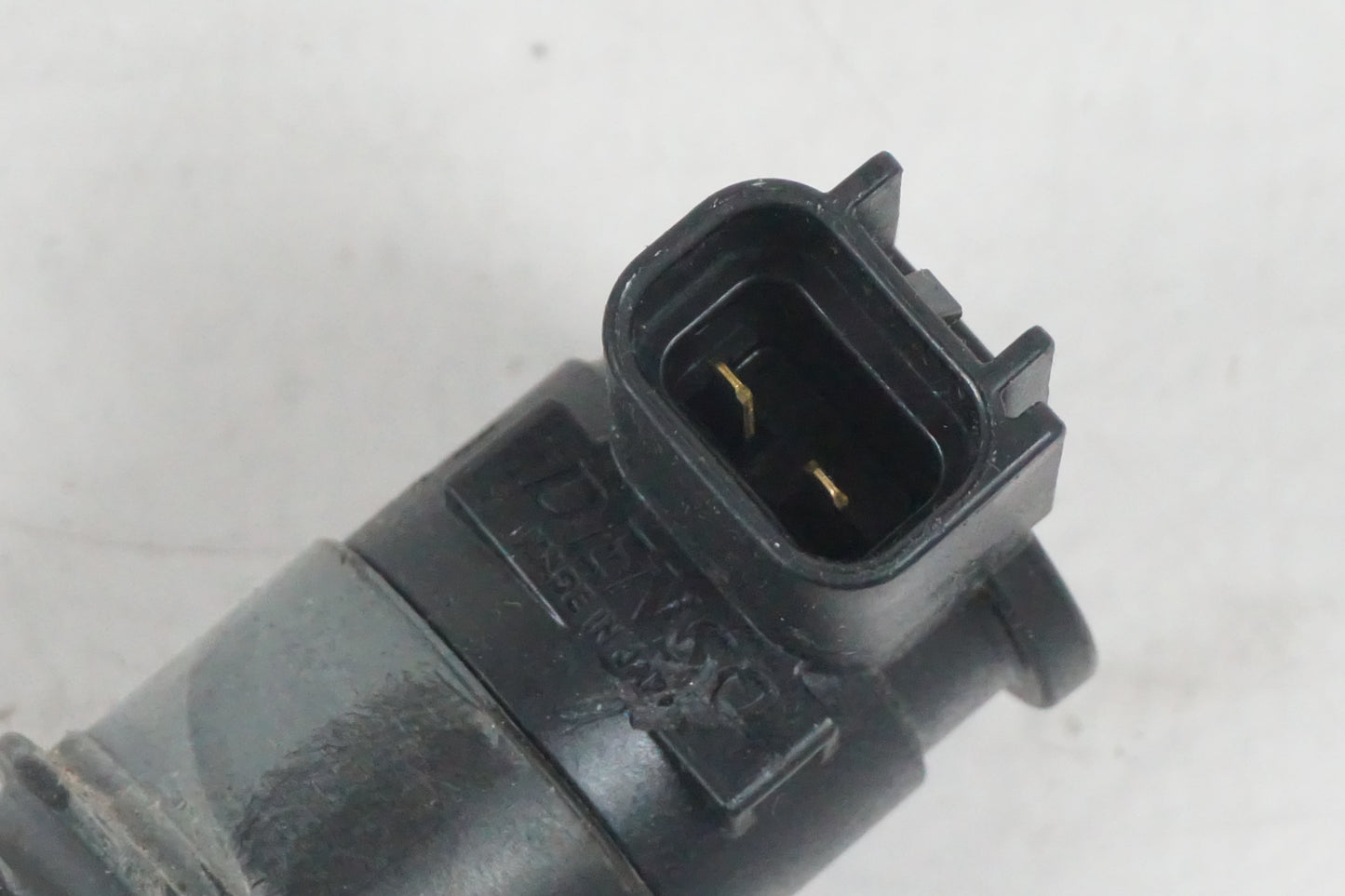 Baksidan på Tändspole från en Suzuki GSF 650 -2011 motorcykel.