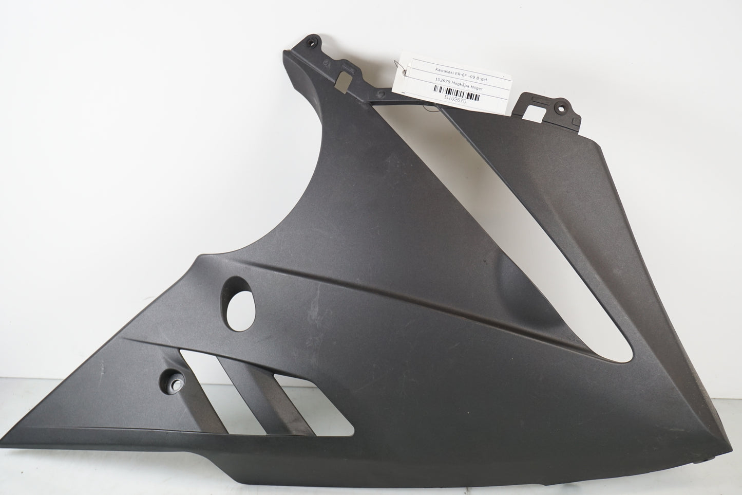 Framsidan på Magkåpa från en Kawasaki ER-6F -2009 motorcykel.
