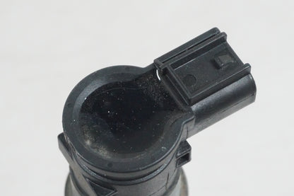 Snett uppifrån på Tändspole från en Suzuki GSF 650 -2011 motorcykel.