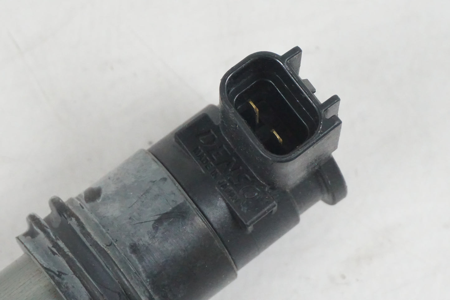 Baksidan på Tändspole från en Suzuki GSF 650 -2011 motorcykel.