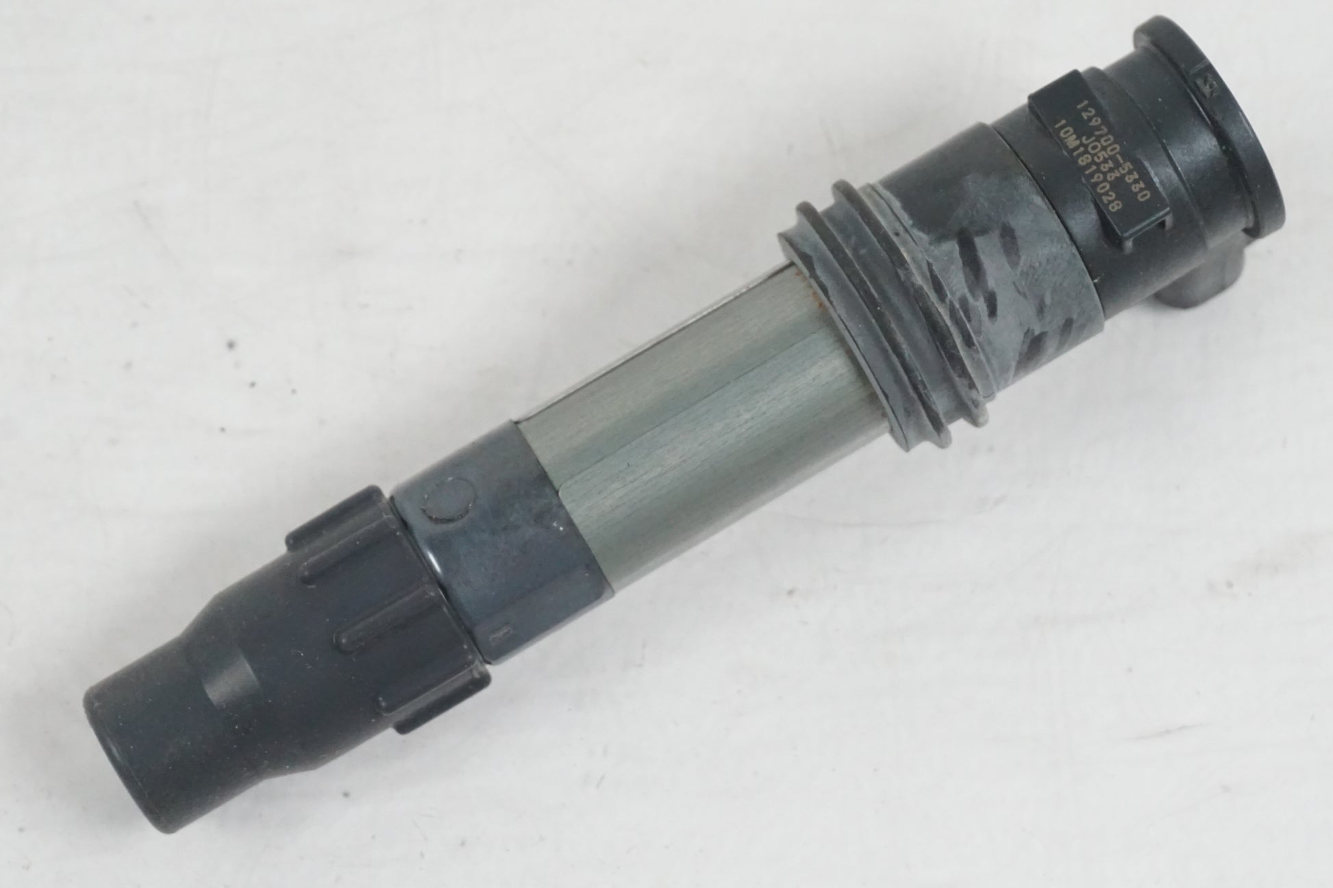 Höger sida på Tändspole från en Suzuki GSF 650 -2011 motorcykel.