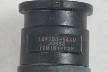 Vänster sida på Tändspole från en Suzuki GSF 650 -2011 motorcykel.