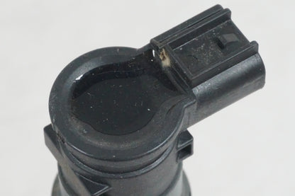 Snett uppifrån på Tändspole från en Suzuki GSF 650 -2011 motorcykel.