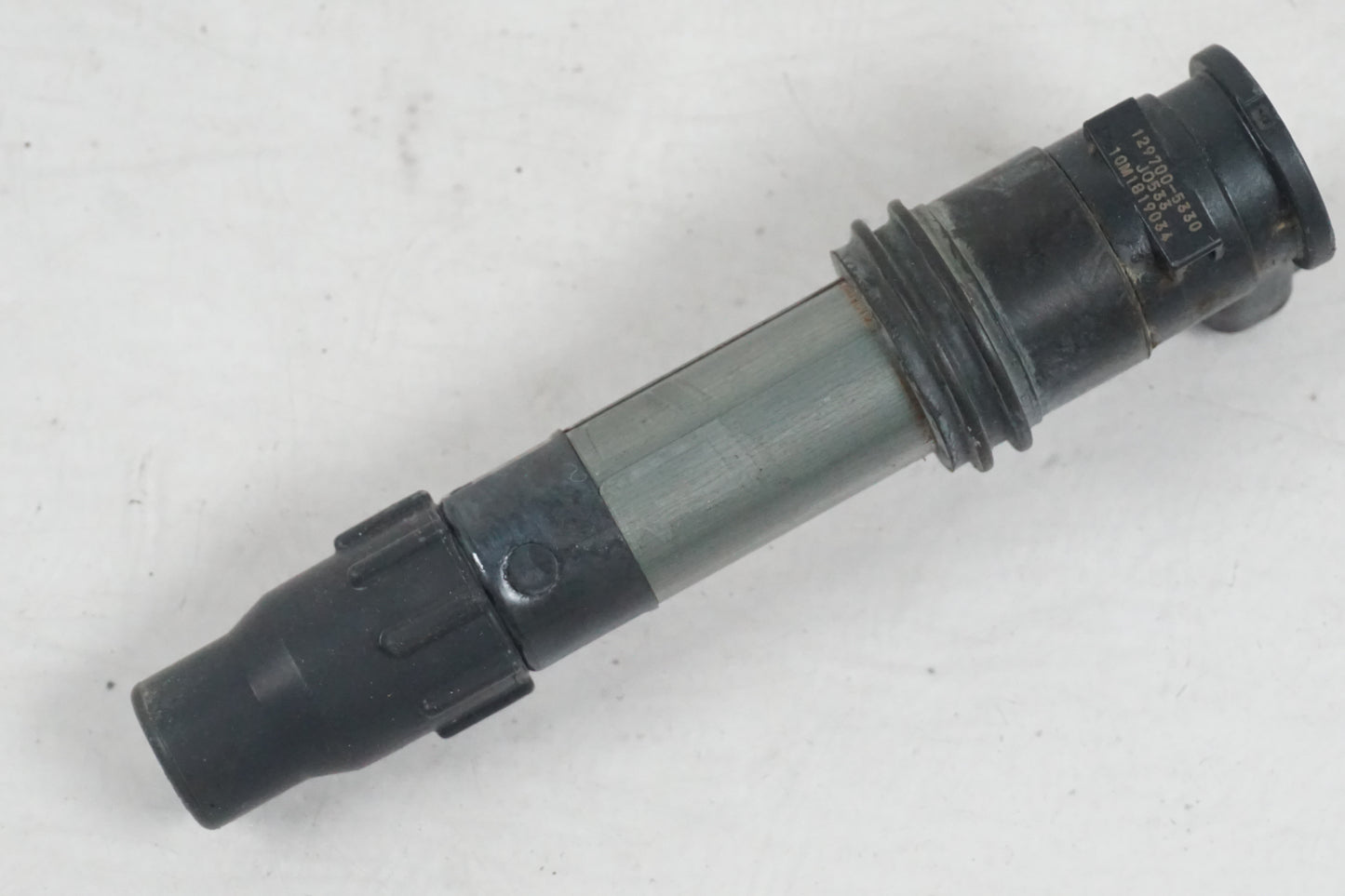 Höger sida på Tändspole från en Suzuki GSF 650 -2011 motorcykel.