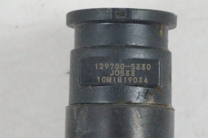 Vänster sida på Tändspole från en Suzuki GSF 650 -2011 motorcykel.