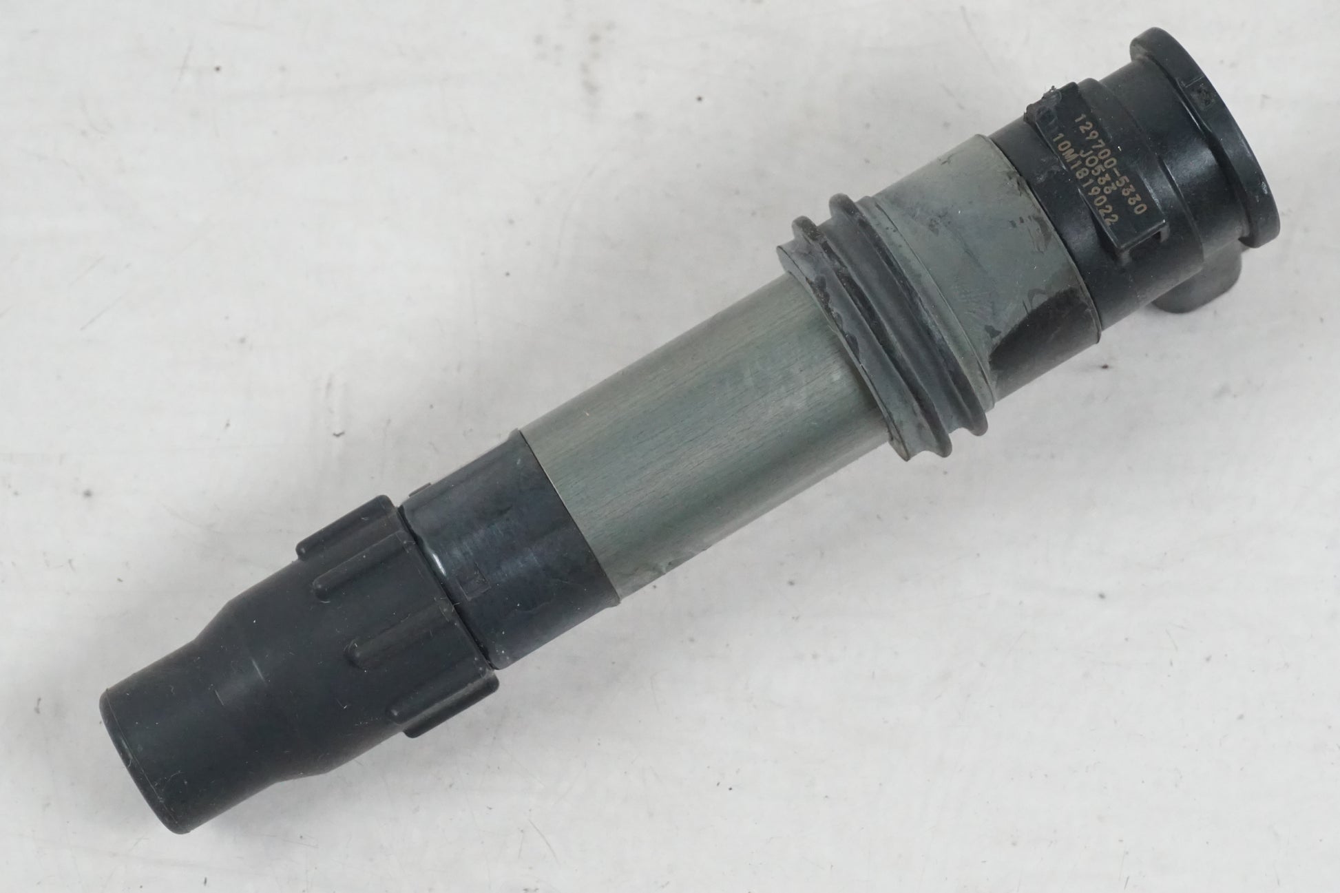 Höger sida på Tändspole från en Suzuki GSF 650 -2011 motorcykel.