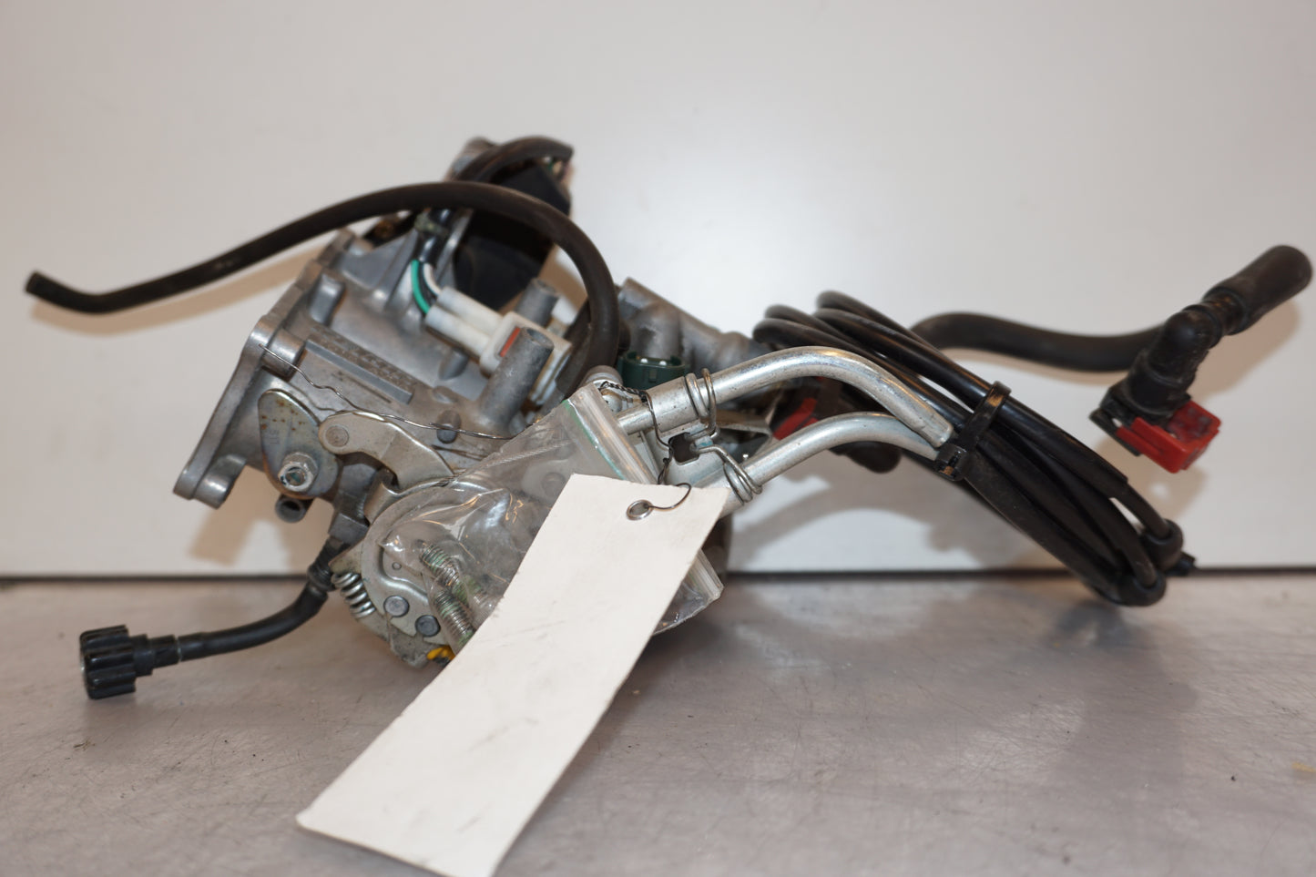 Baksidan på Spjällhus från en Kawasaki VN 900 -2007 motorcykel.