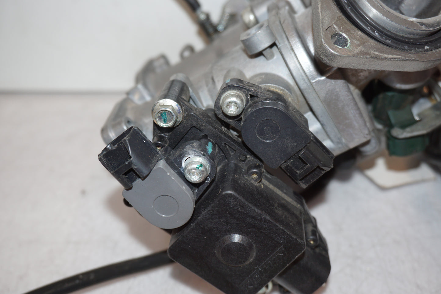 Snett nerifrån på Spjällhus från en Kawasaki VN 900 -2007 motorcykel.