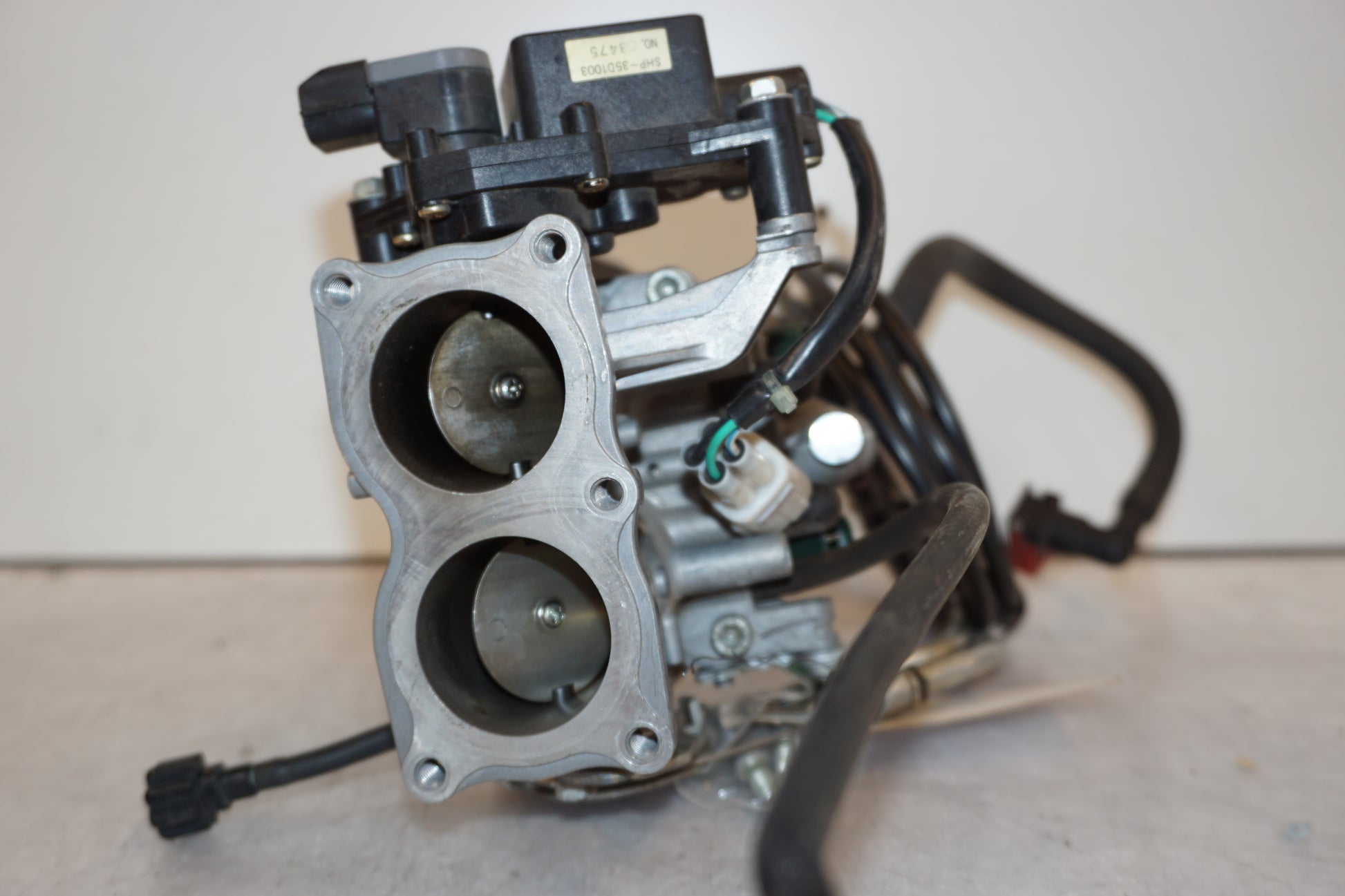 Extrabild2 på Spjällhus från en Kawasaki VN 900 -2007 motorcykel.