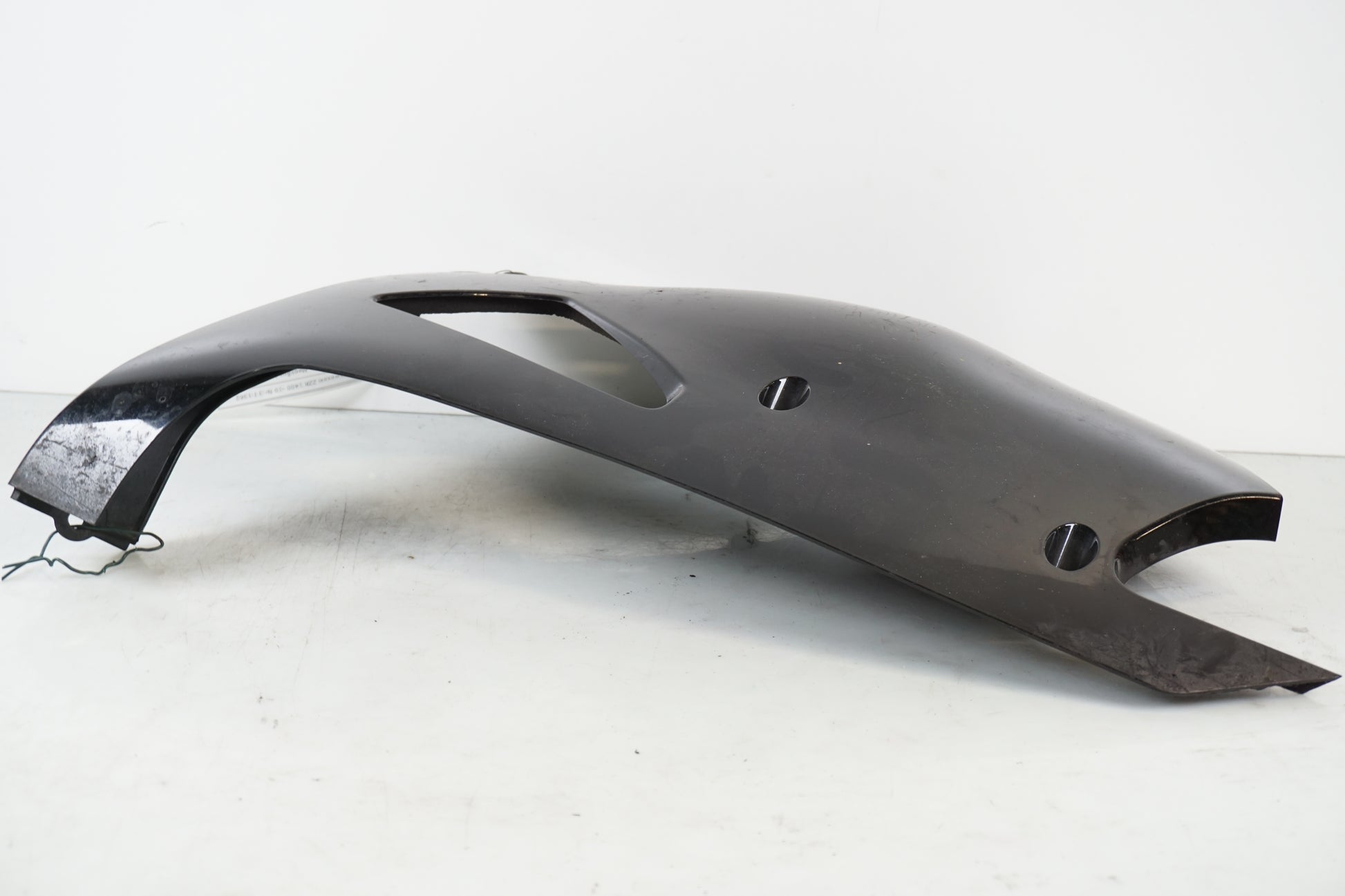 Vänster sida på Magkåpa från en Kawasaki ZZ-R 1400 -2010 motorcykel.