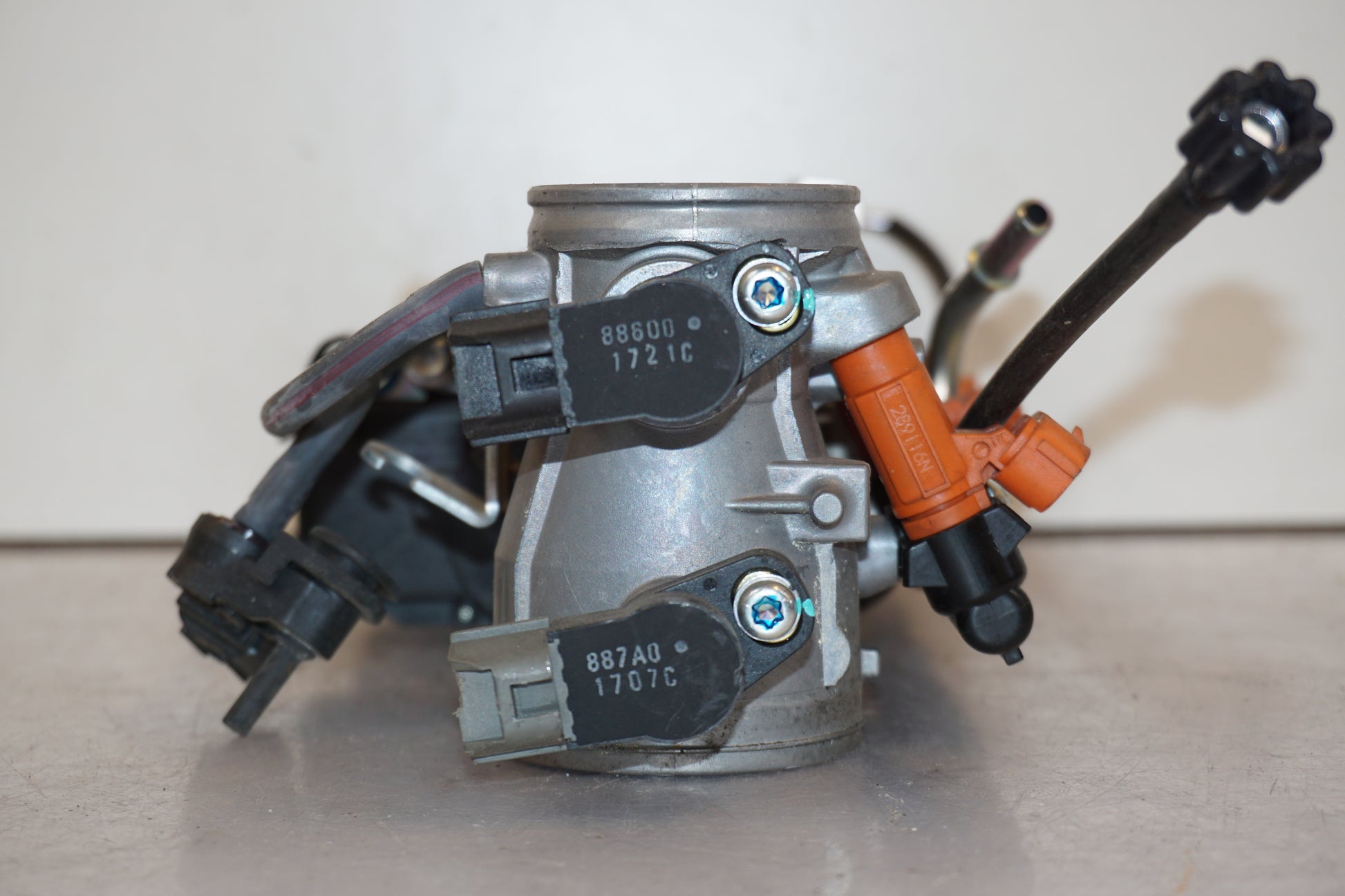 Extrabilder på Spjällhus från en Kawasaki VN 900 -2007 motorcykel.