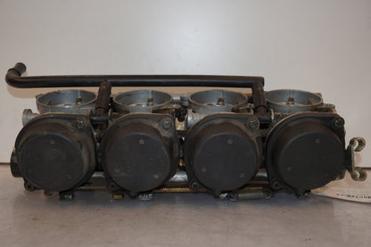 Baksidan på Förgasare från en Kawasaki ZX-6R -2002 motorcykel.