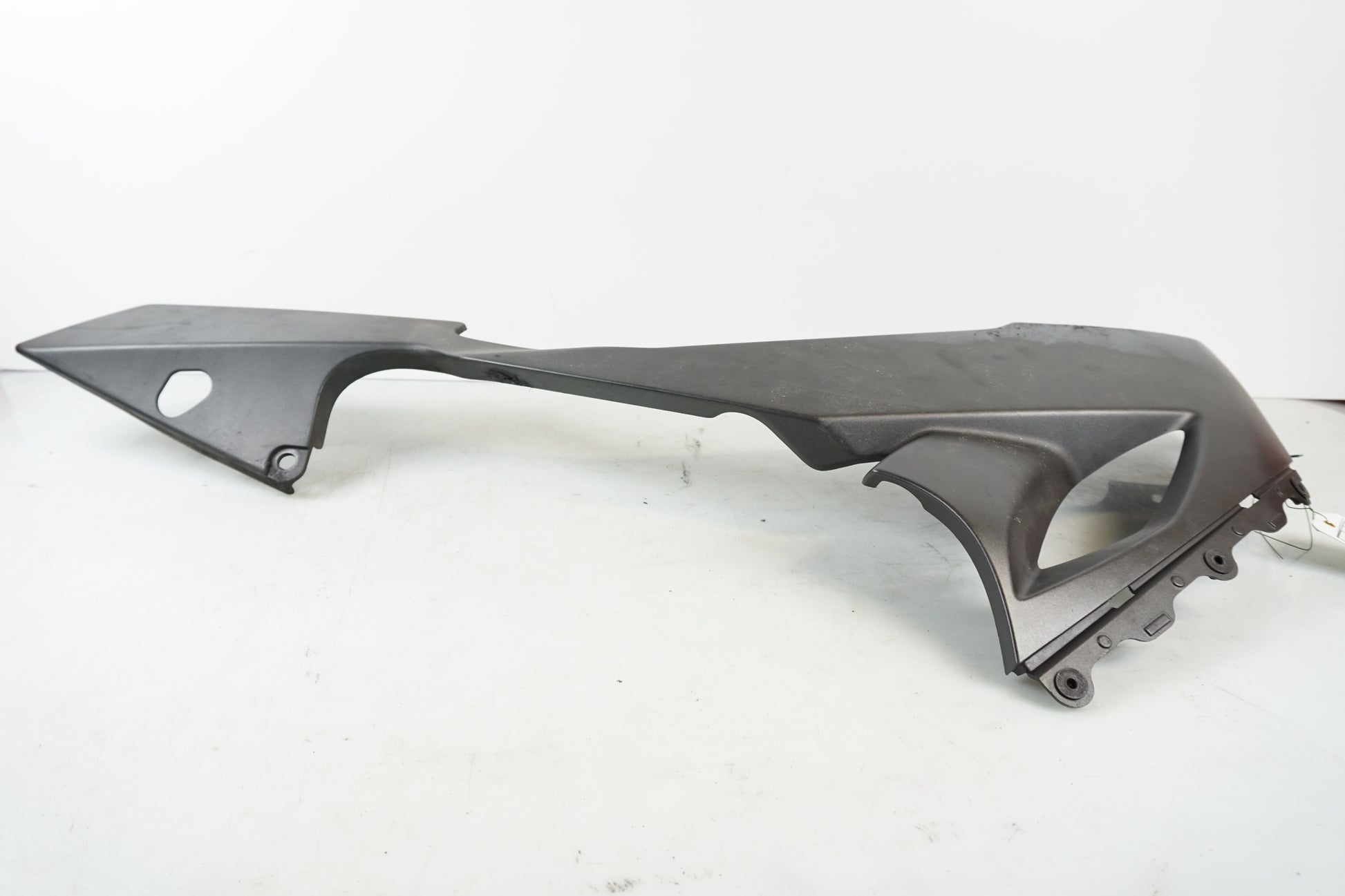 Vänster sida på Magkåpa från en Kawasaki ZX-10R -2008 motorcykel.