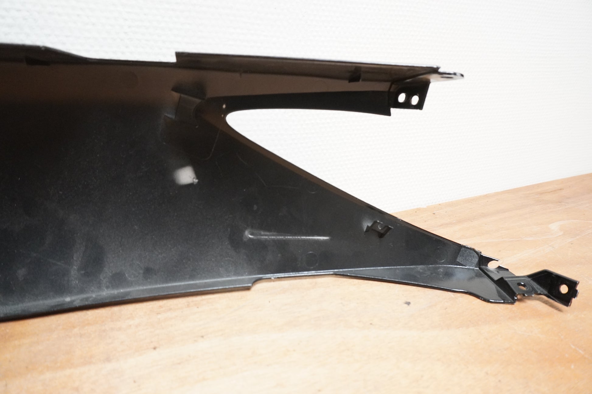 Vänster sida på Bakvinge från en Yamaha X-Max 250 -2012 scooter.