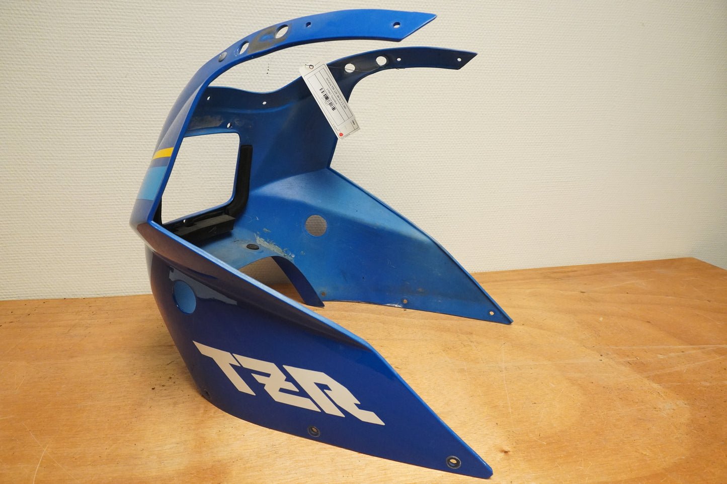 Vänster sida på Toppkåpa från en Yamaha TZR 125 -1989 motorcykel.