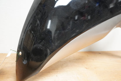 Vänster sida på Sidkåpa från en Suzuki GSX-R 750 -2010 motorcykel.