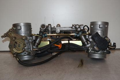 Baksidan på Spjällhus från en Suzuki TL 1000 S -1997 motorcykel.