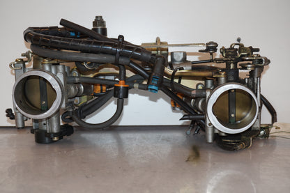 Framsidan på Spjällhus från en Suzuki TL 1000 S -1998 motorcykel.