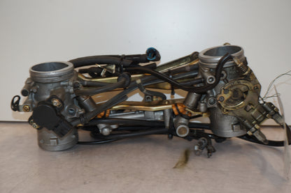 Baksidan på Spjällhus från en Suzuki TL 1000 S -1998 motorcykel.