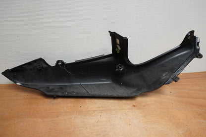 Vänster sida på Bakvinge från en Triumph Speed Triple -2005 motorcykel.