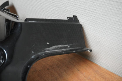 Vänster sida på Bakvinge från en Triumph Speed Triple -2005 motorcykel.