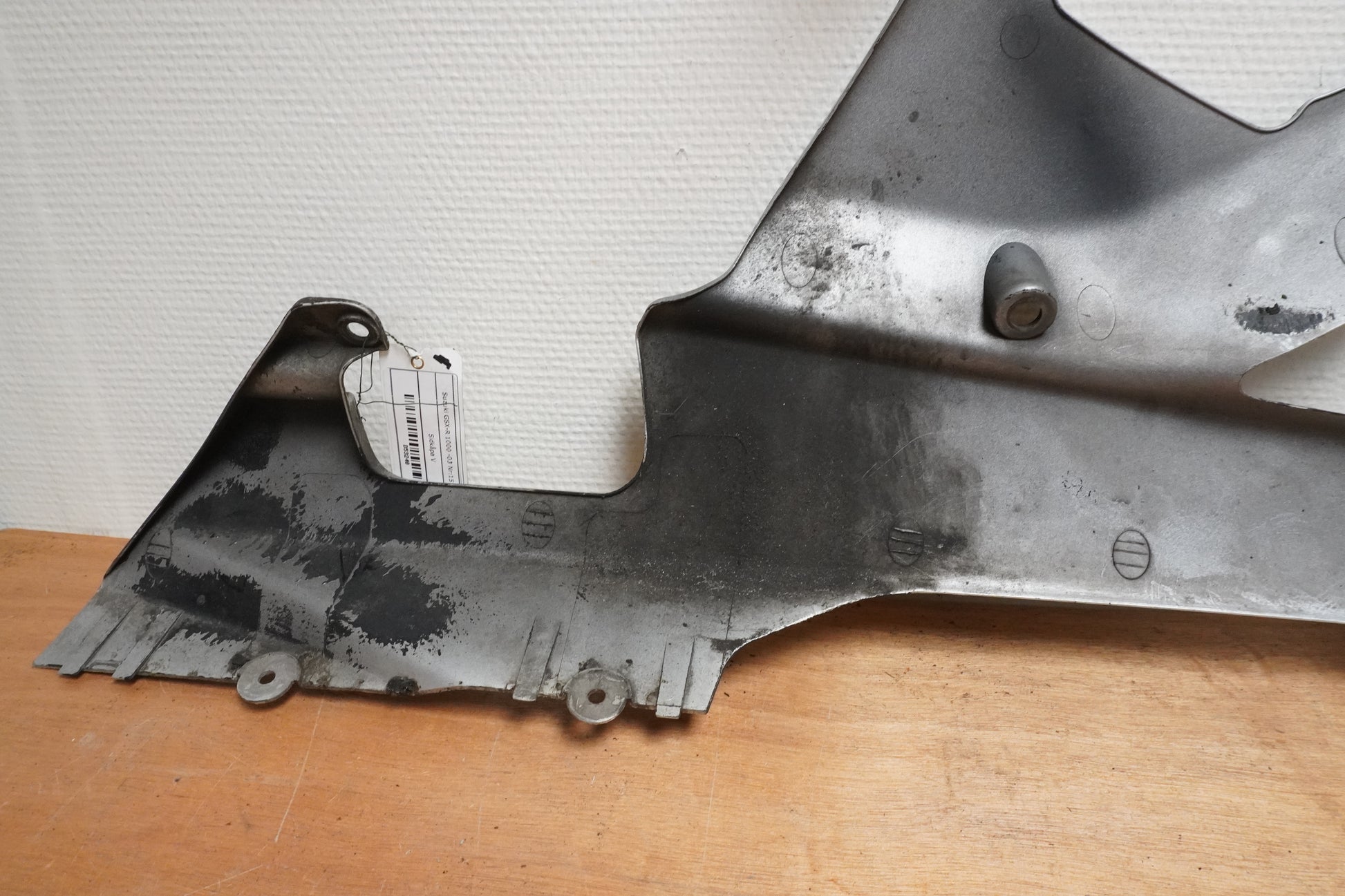 Vänster sida på Sidkåpa från en Suzuki GSX-R 1000 -2003 motorcykel.