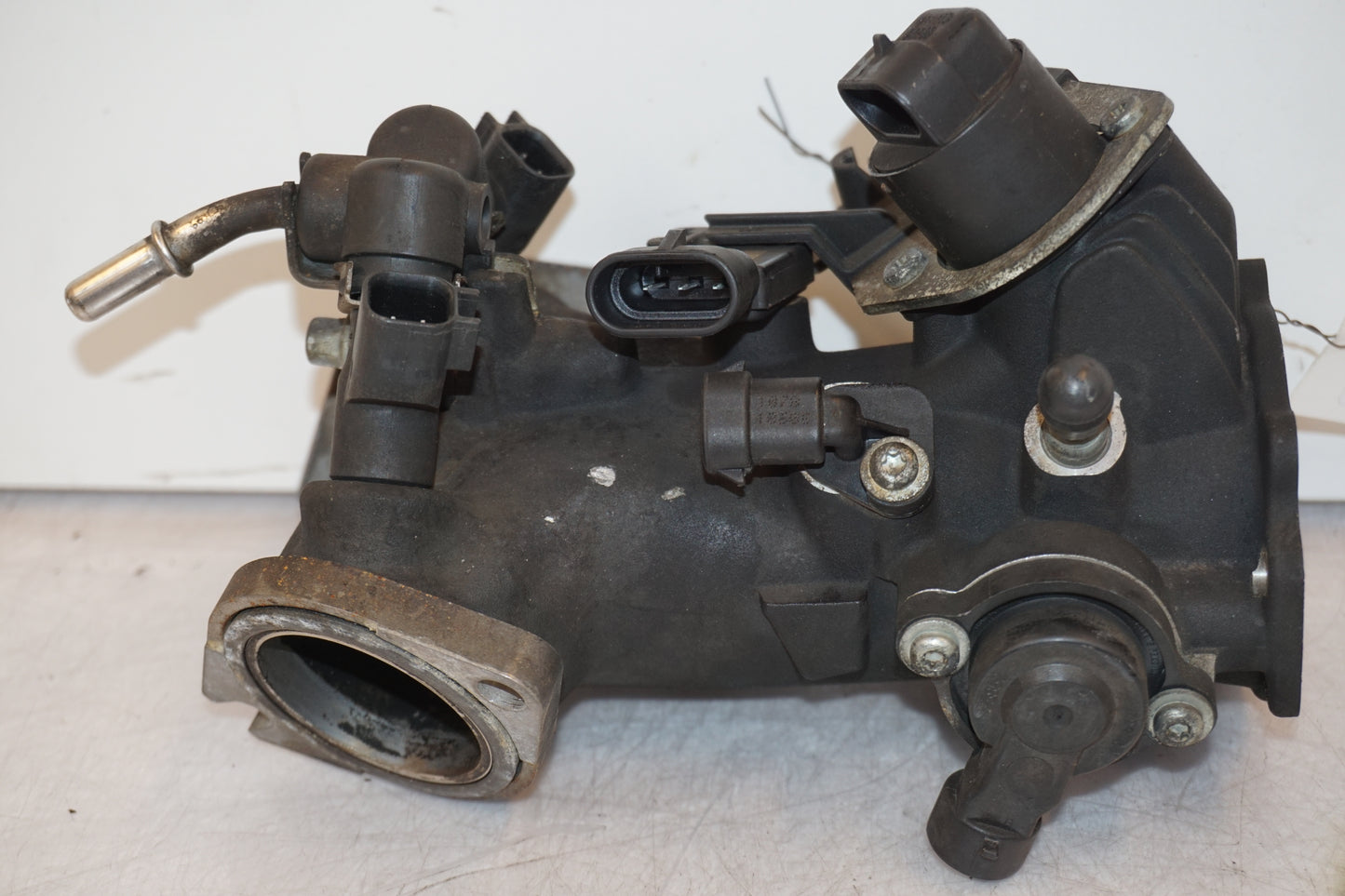 Framsidan på Spjällhus från en H-D Dyna Street Bob FXDB/I -2007 motorcykel.